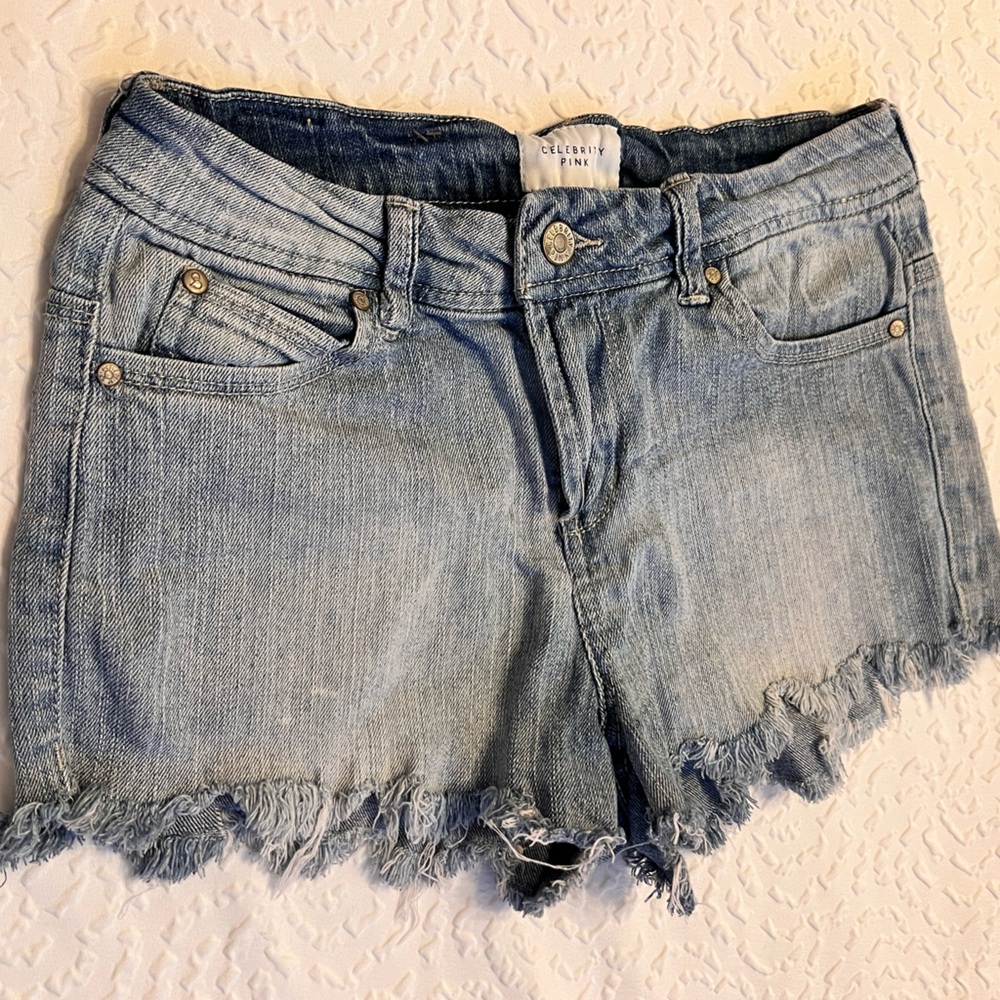Celebrity Pink Distressed light denim jean shorts- size 3/26
